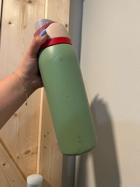 Owala Green Stainless Steel Water Bottle with Red Accent